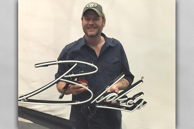 Blake Shelton with neon sign
