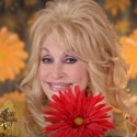 Dolly Parton Sets the Record Straight on Supporting Hillary Clinton & Says Political Race Could “Use More Boobs”
