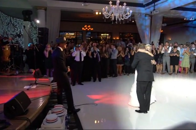 Tim McGraw singing during father-daughter dance at a wedding
