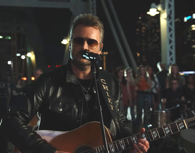 Eric Church performing on Nashville's pedestrian bridge