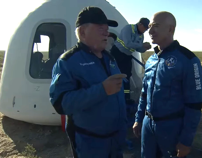 William Shatner and Jeff Bezos talking after Blue Origin space flight.