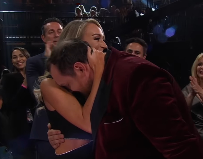 Luke Combs hugging his wife Nicole at 2021 CMA Awards 11-10-21