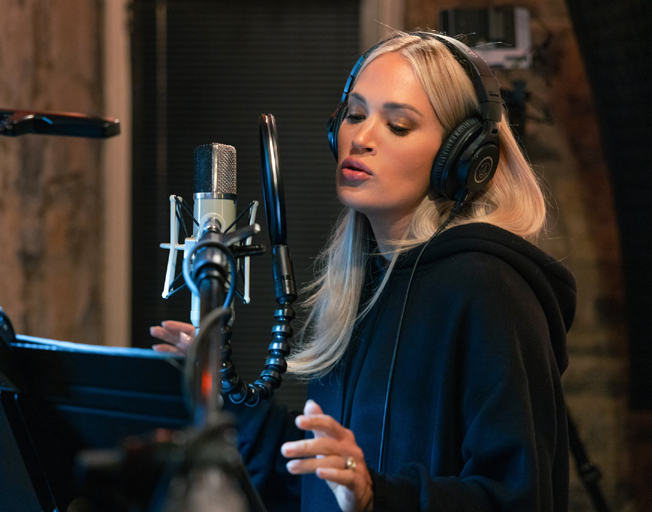 Carrie Underwood in a recording studio