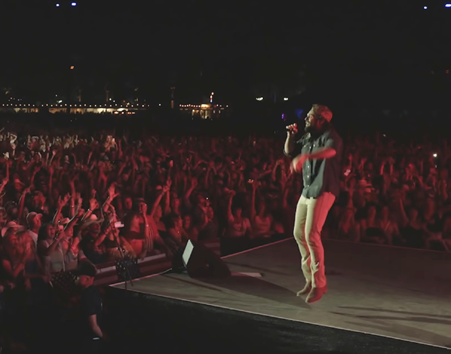 Thomas Rhett performing on stage