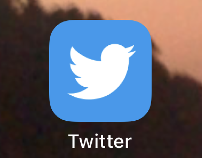 Twitter app icon on iPhone screen