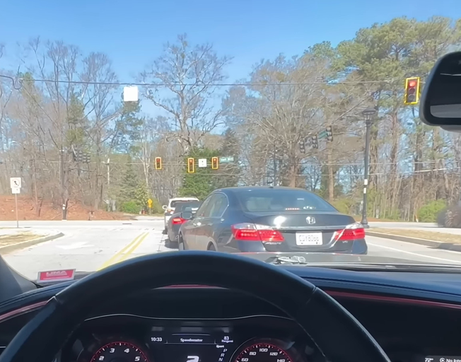 View from driver's seat out windshield of a car